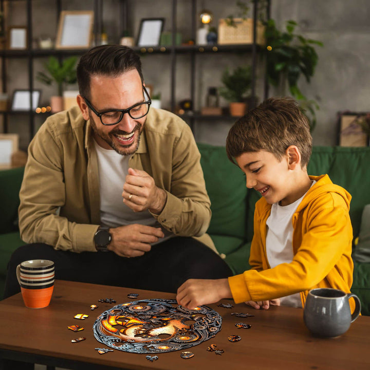 Father and son happily solving a Mechanical Dragon Egg wooden jigsaw puzzle together, fostering family bonding.