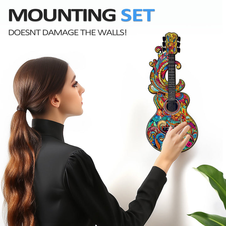 Woman mounting a colorful guitar jigsaw puzzle on the wall without damage, showcasing a unique decor piece.
