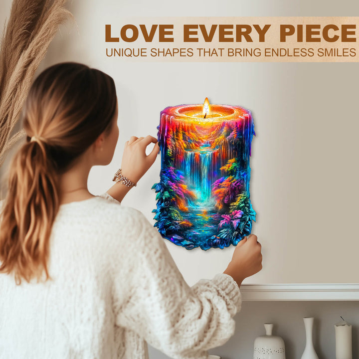 Person admiring Enchanted Flame wooden jigsaw puzzle, featuring vibrant colors and unique shapes for a joyful experience.
