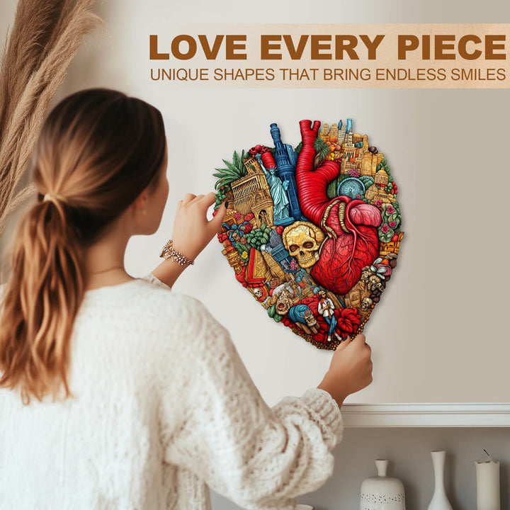 Woman assembling Heart of the City wooden jigsaw puzzle featuring vibrant and unique shapes.