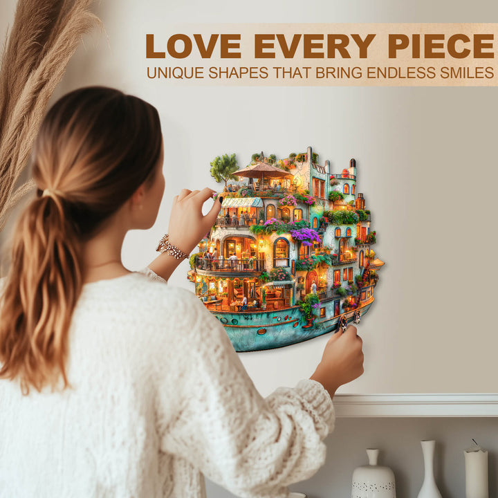 Woman enjoying the unique shapes of a wooden jigsaw puzzle featuring a vibrant garden scene, fostering focus and joy.
