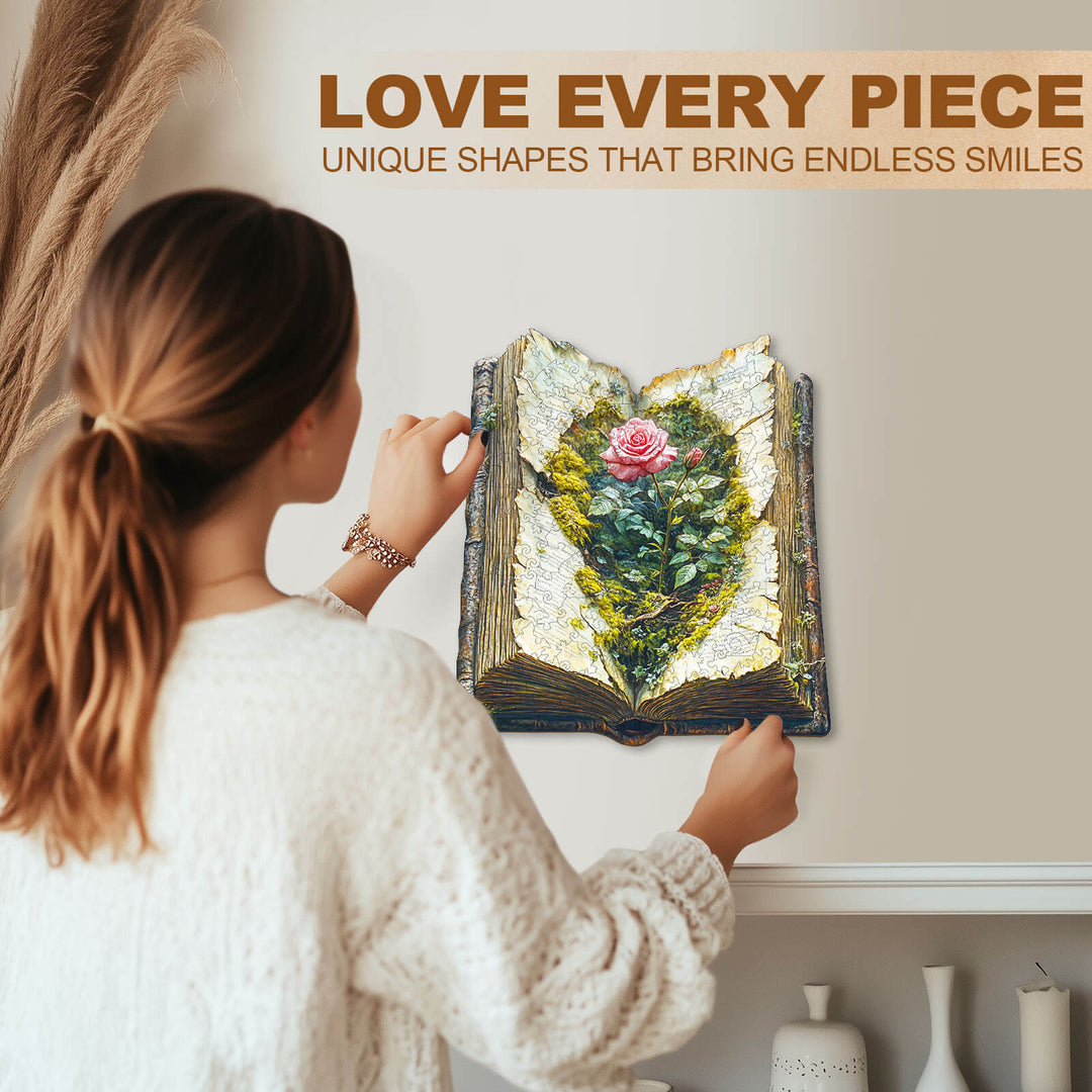 Woman assembling The Last Bloom wooden jigsaw puzzle, featuring unique pieces and a floral design.